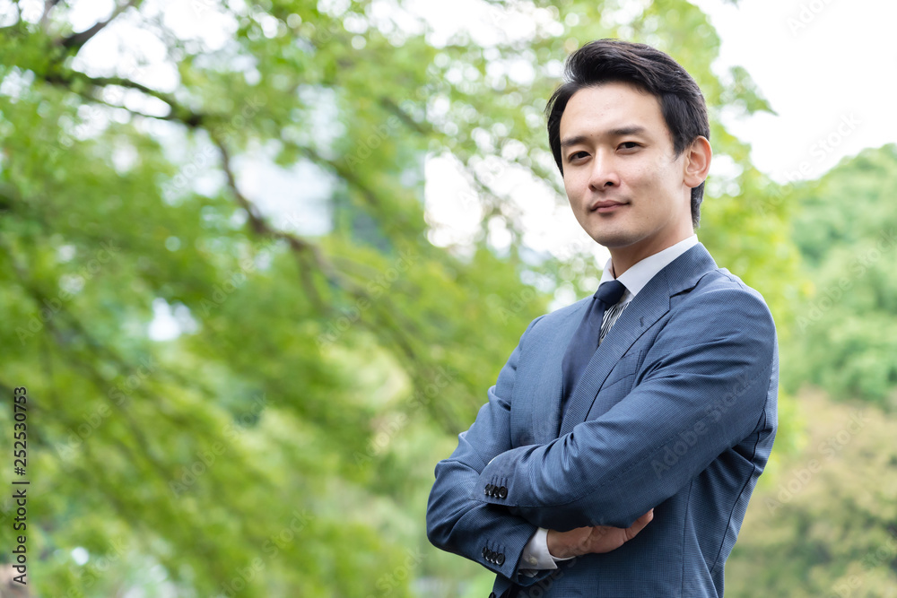 portrait of asian businessman in park portrait of asian businessman in park