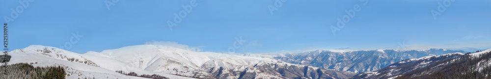 Panoramic view of snow mountains