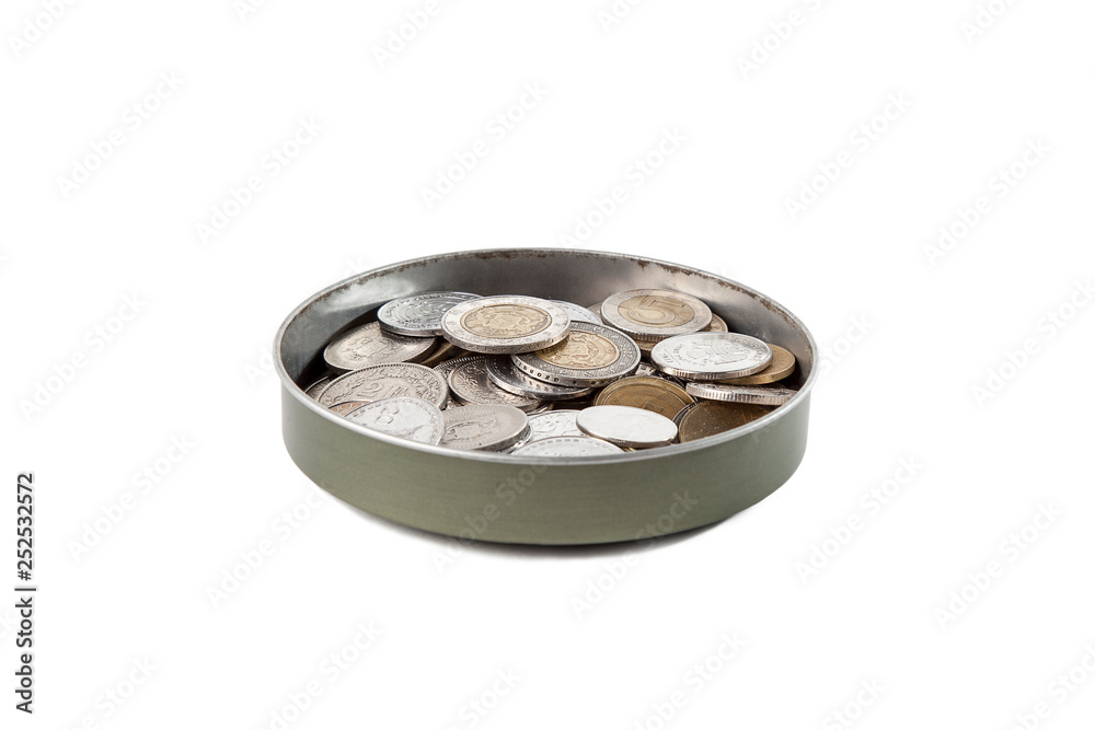 Can with coins of different countries on a white isolated background