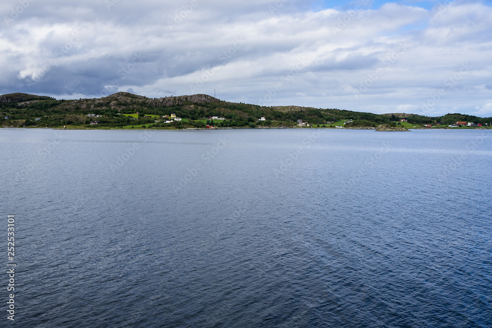 Fjord landscape along the Atlantic coast of southern Norway viewed from cruise ship