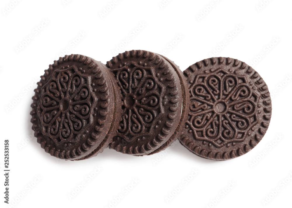Tasty chocolate cookies with cream on white background, top view Tasty chocolate cookies with cream on white background, top view