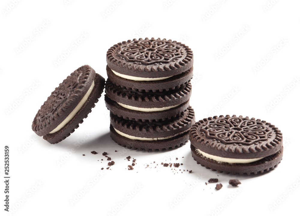 Tasty chocolate cookies and crumbs on white background Tasty chocolate cookies and crumbs on white background