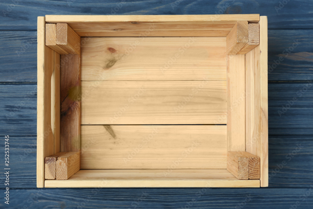 Empty wooden crate on color background, top view Empty wooden crate on color background, top view