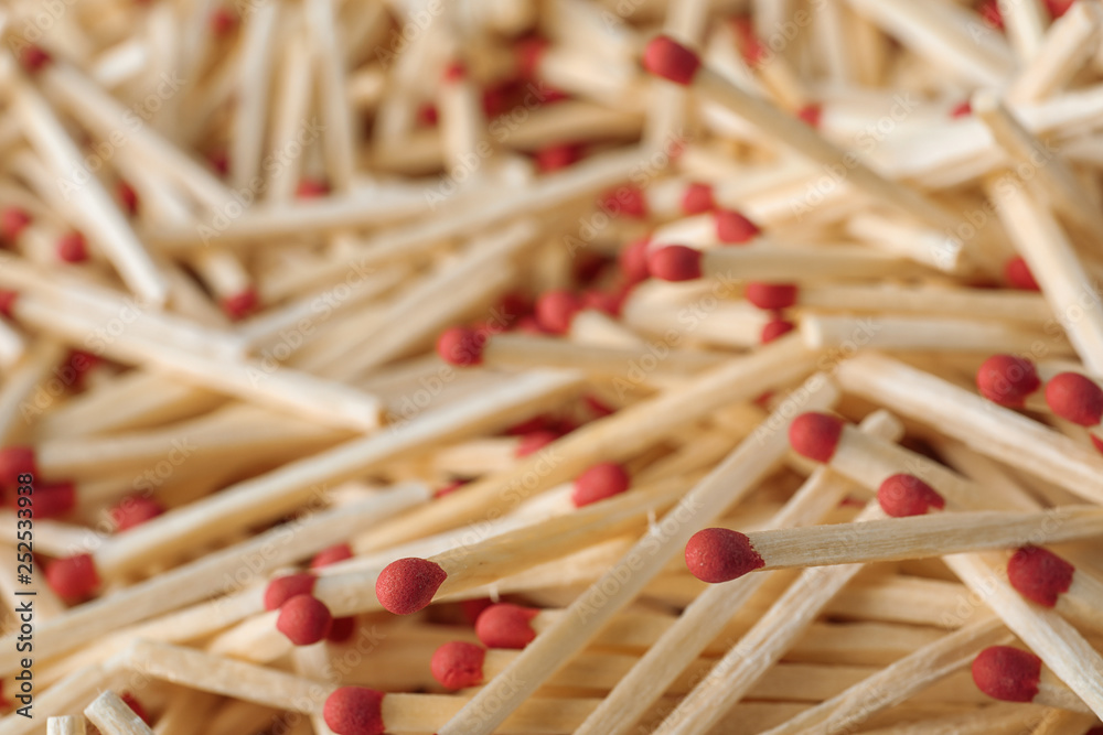Pile of wooden matches as background, closeup