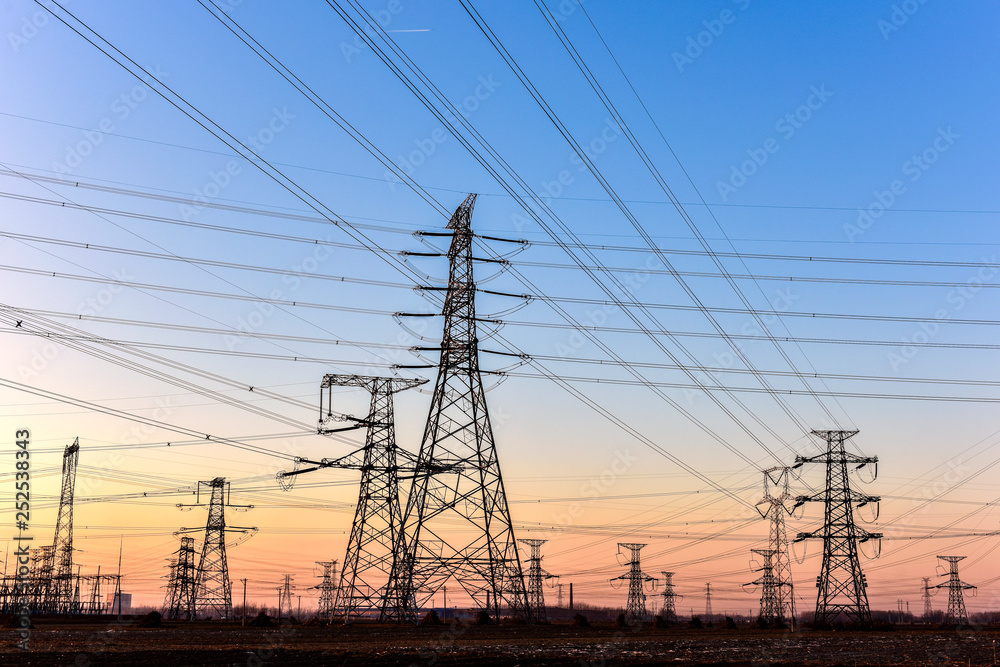 The Contour of Transmission Tower in the Background of Sunset