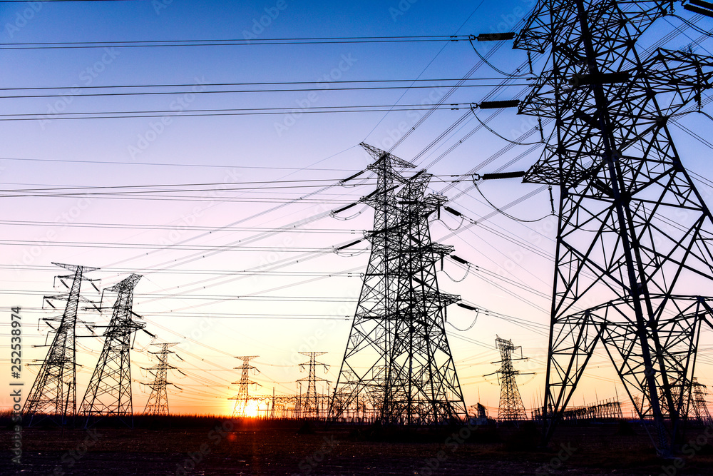 The Contour of Transmission Tower in the Background of Sunset