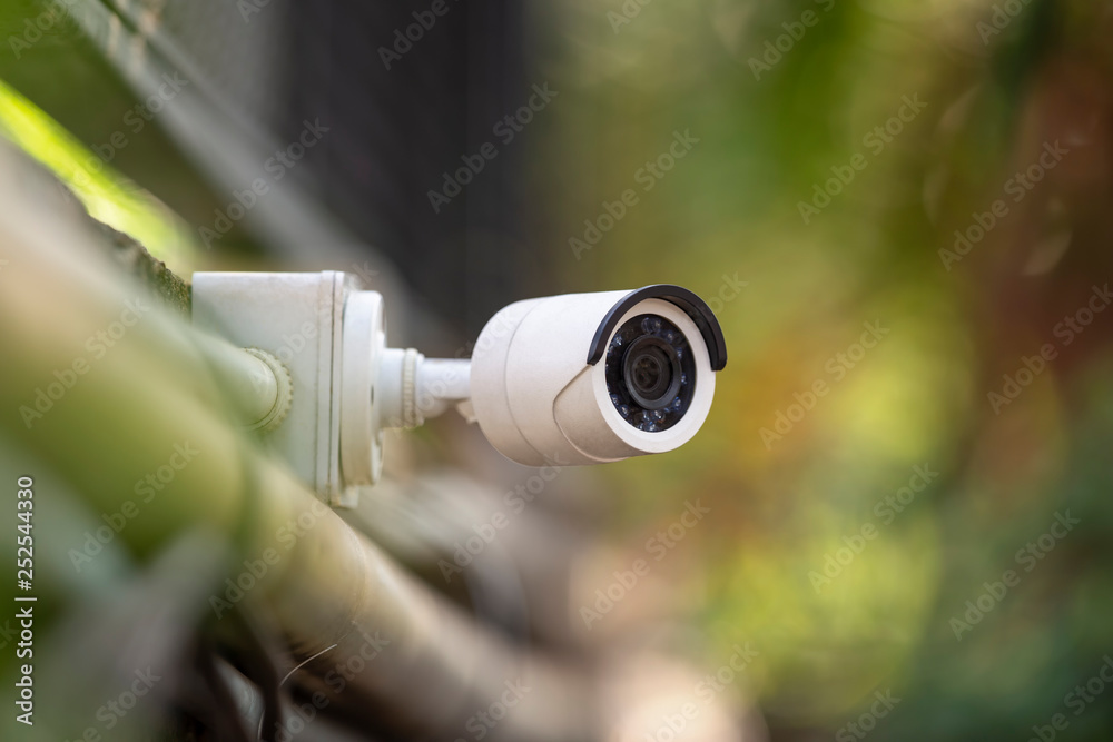 A white CCTV  seurity shallow focus