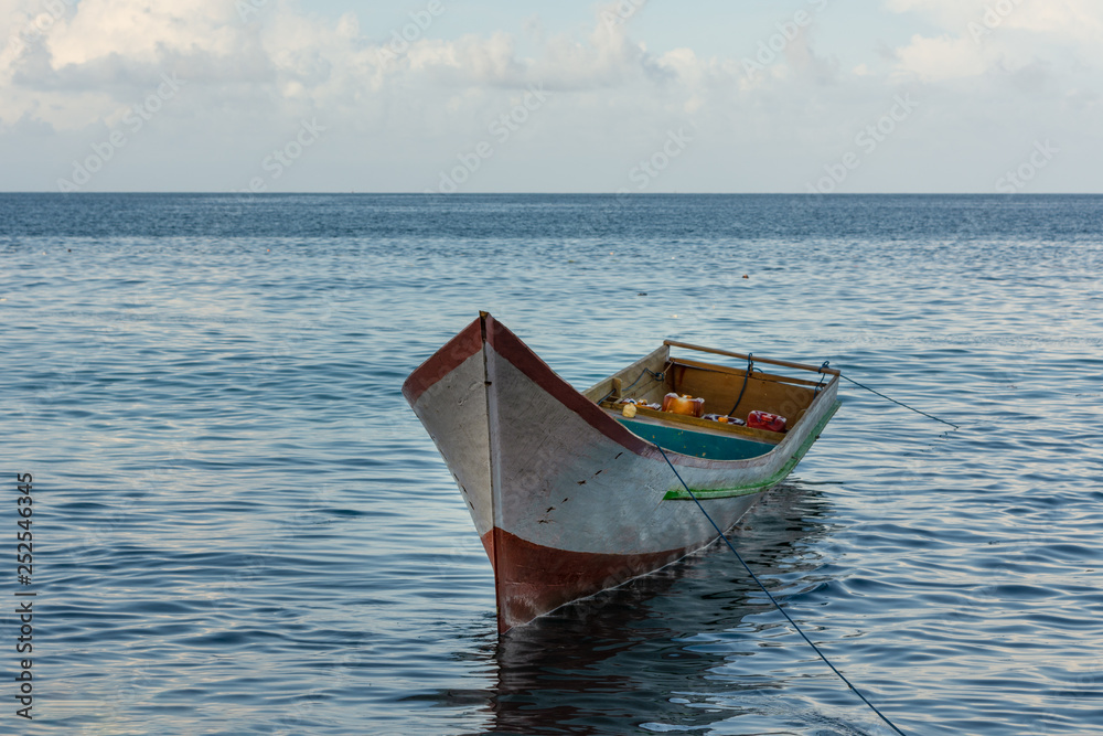 Fototapeta premium wooden boat parked at the beach