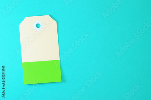 clipped rectangle paper tag on blue background horizontal template