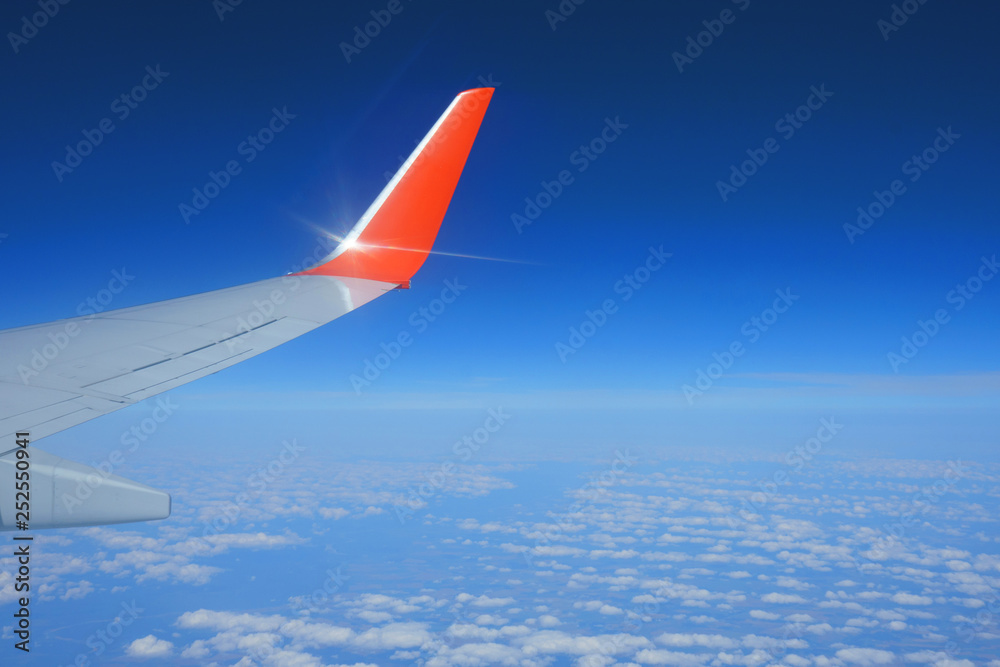 Airplane wing during the flight above the earth. Airplane wing during the flight above the earth.