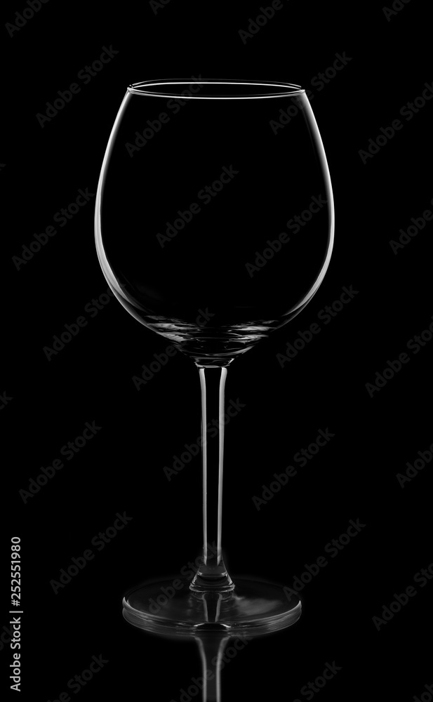 glass of red wine isolated on black background