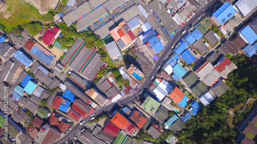 Drone fly down above the road junction and streets at Patong,Phuket island,Thailand,zoom shot