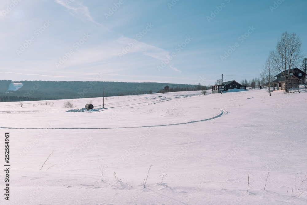 Village in the winter. Houses in Siberia under the snow. Buildings in the snow. Countryside in winter. Village in the winter. Houses in Siberia under the snow. Buildings in the snow. Countryside in winter.