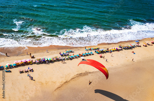 Paragliding on the beach of Arambol in Goa,India