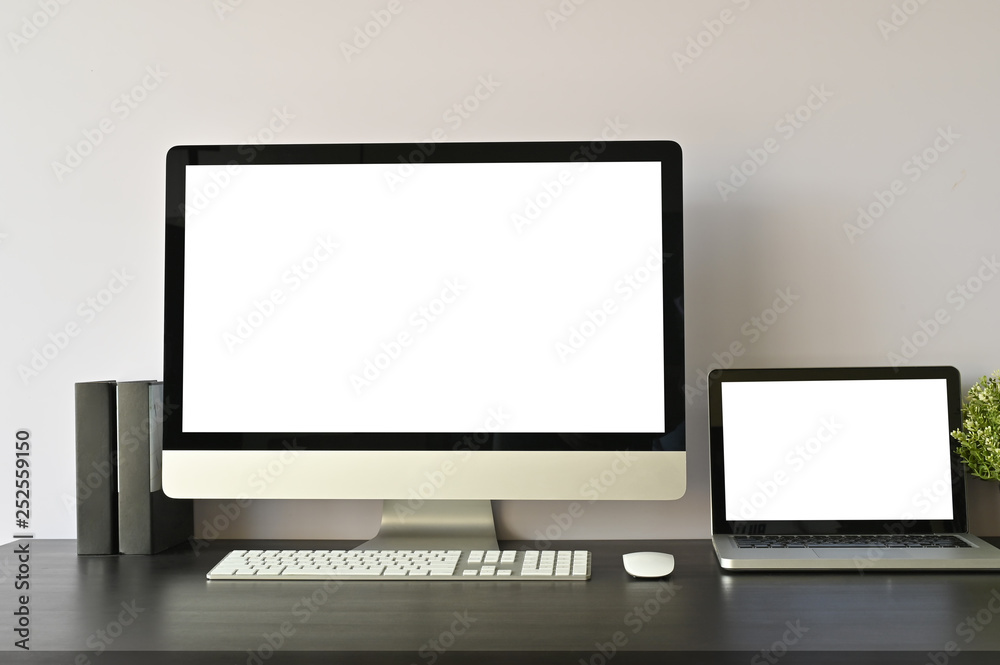 Mockup computer pc and laptop on workspace. Mockup computer pc and laptop on workspace.