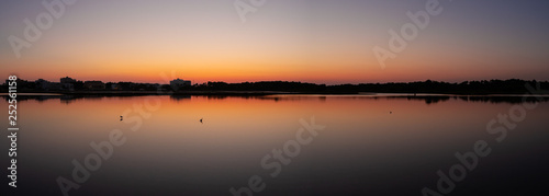 Amazing landscape of the beautiful salt flats during the sunset at Colonia de Sant Jordi, Ses Salines, Mallorca, Spain photo