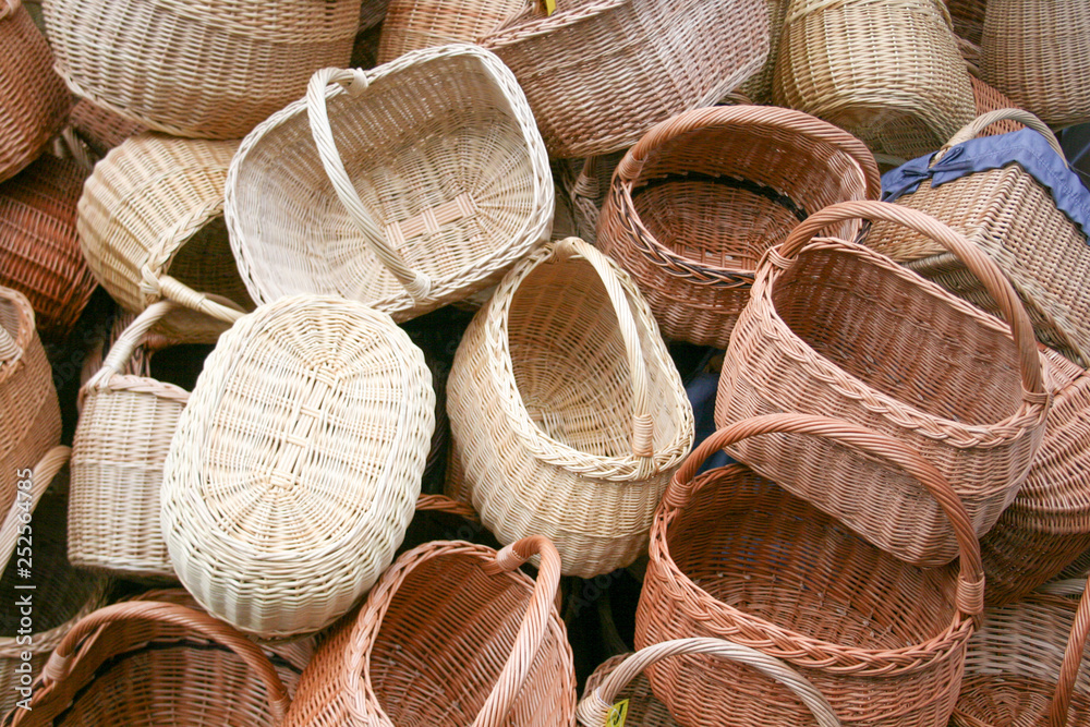 Group of empty wicker baskets for sale in a market place Group of empty wicker baskets for sale in a market place