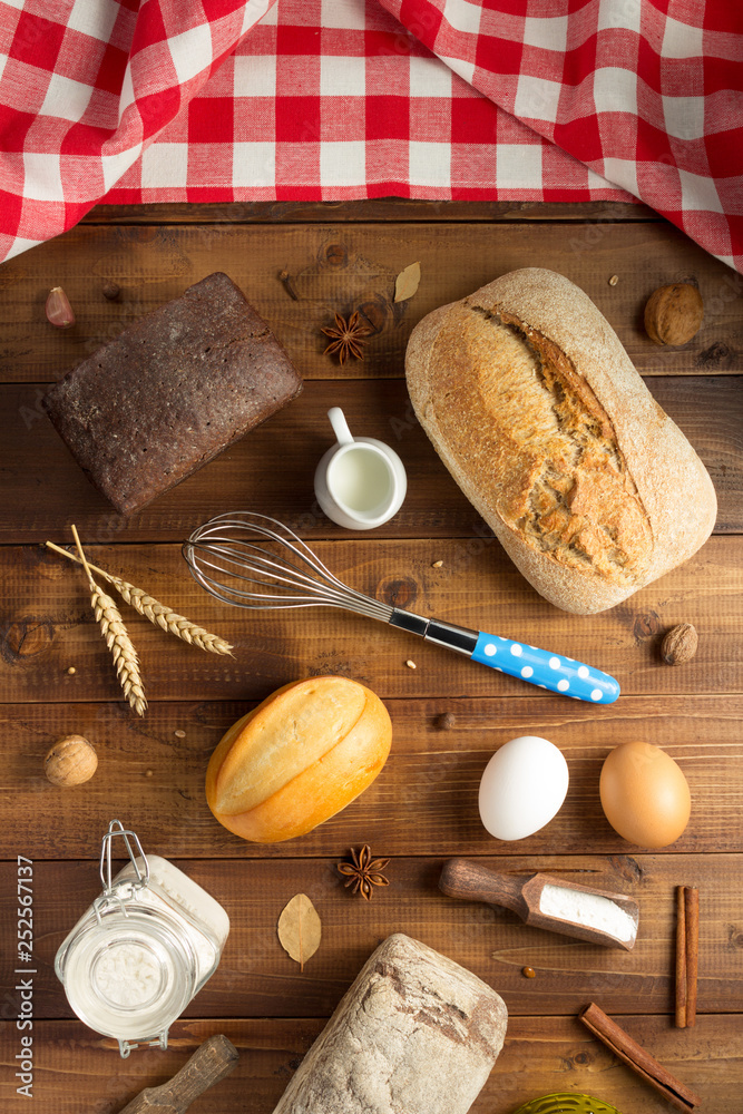 bread and bakery ingredients on wood bread and bakery ingredients on wood