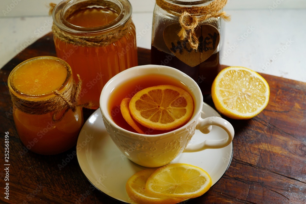 Hot tea with spices, honey and syrup - an alternative to antibiotics - selective focus Hot tea with spices, honey and syrup - an alternative to antibiotics - selective focus