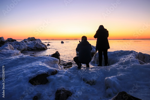 Sunrise by the sea in winter