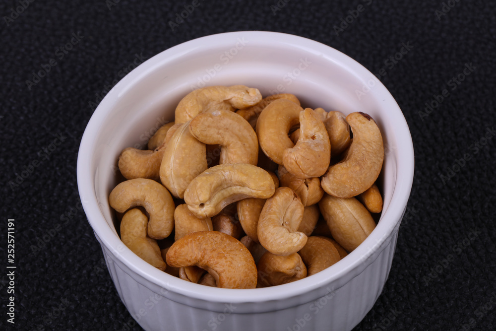 Cashew nuts heap in the bowl Cashew nuts heap in the bowl