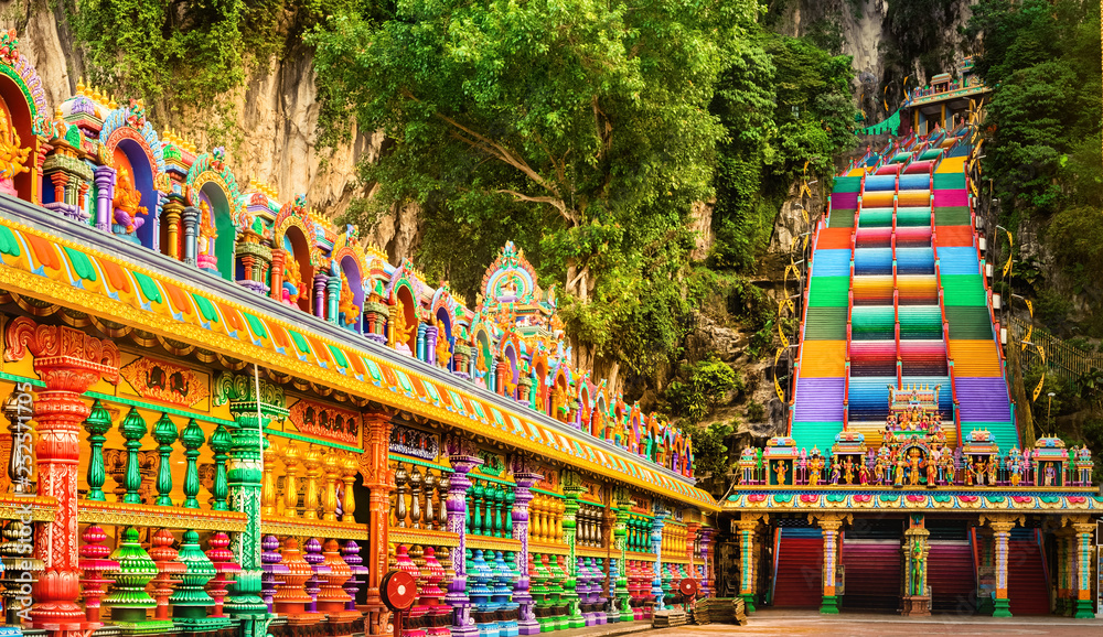 Fototapeta premium Colorful stairs of Batu caves, Malaysia. Panorama