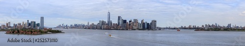 Panorama view of New York City Skyline with skyscrapers and Ellis Island. Manhattan view from Liberty Island..