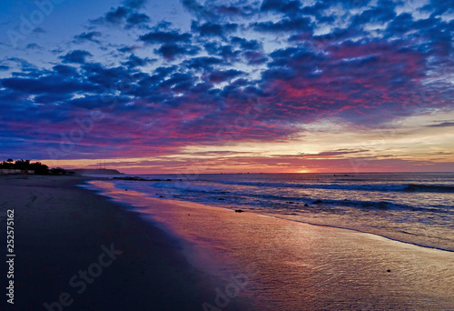 Sunset at the beach of Zorritos in Peru