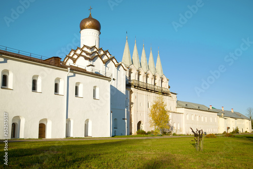 Belfry and Pokrovskaya Church of the Tikhvinsky Uspensky Monastery on a sunny October day. Tikhvin, Russia photo