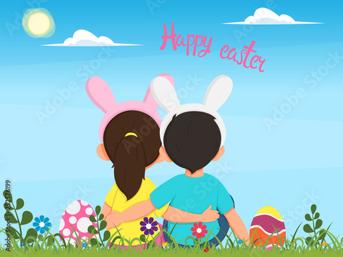 children in rabbits costumes sit in the grass among Easter eggs and look into the beautiful spring sky.