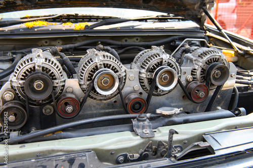 Four alternator for the car attached on engine