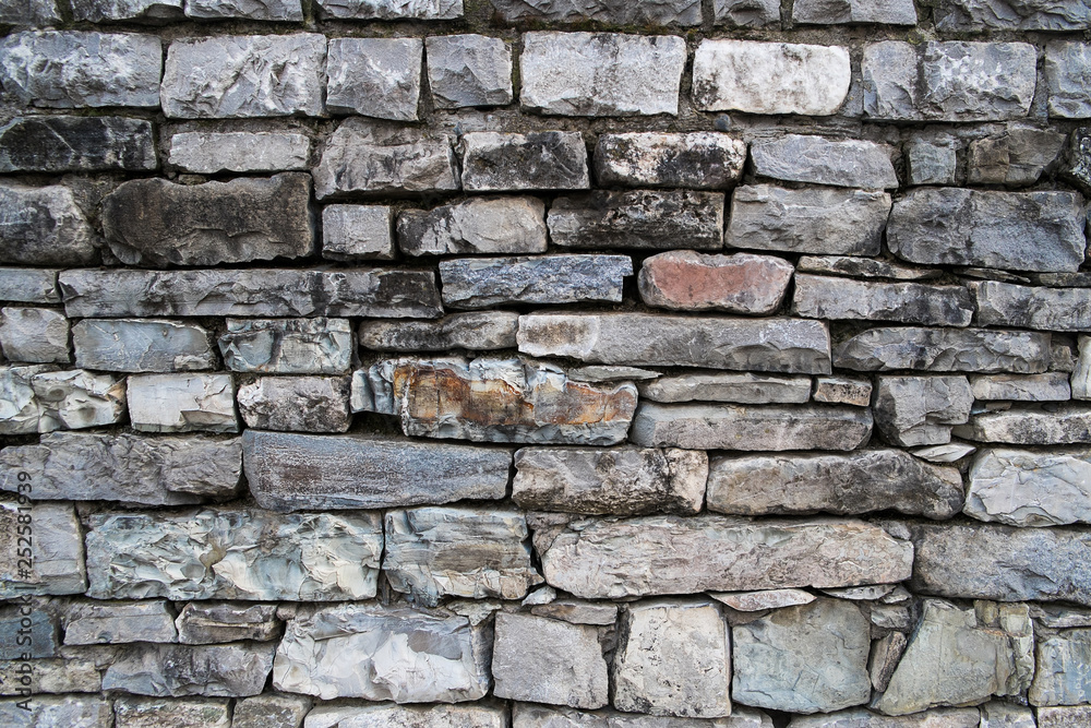 Old stone wall texture - multicolored Old stone wall texture - multicolored