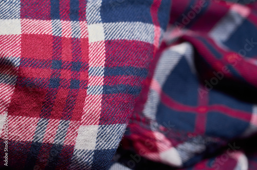 Macro photo of fabric pattern, close up of textile clothing with shallow depth of field