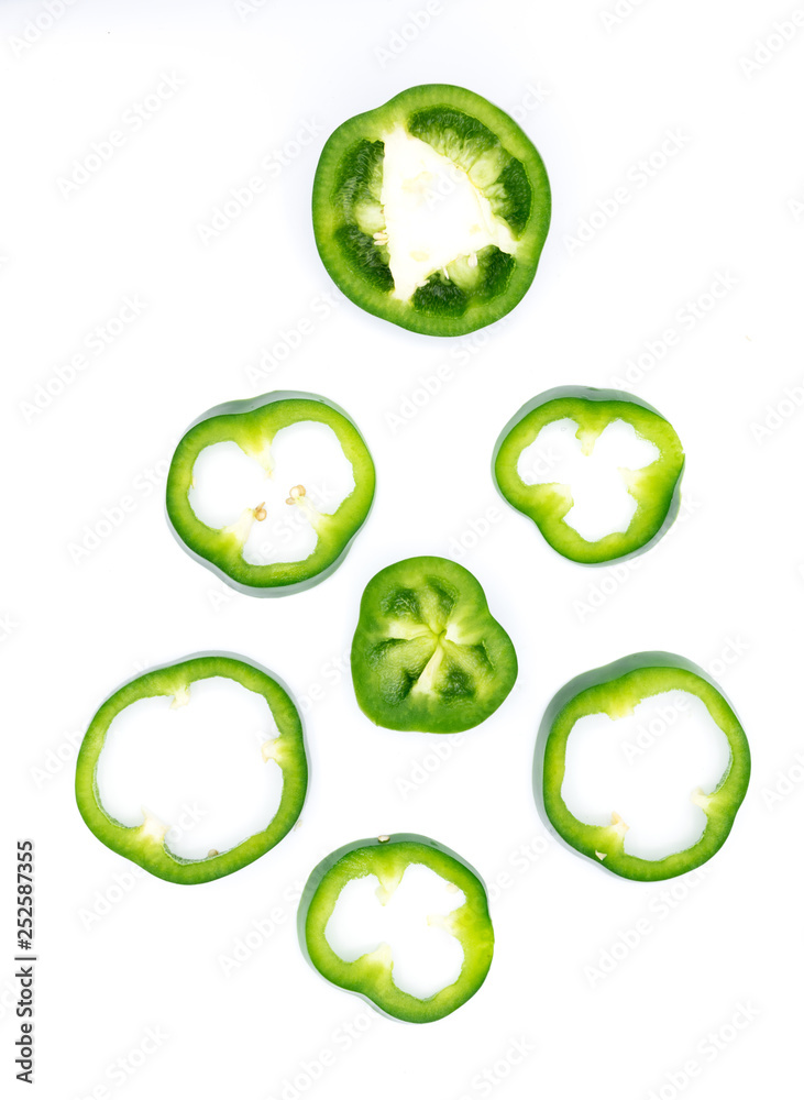 Set of sliced red bell pepper section pieces isolated over white background, view above Set of sliced red bell pepper section pieces isolated over white background, view above