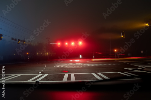 Fast night driving on highway, view from inside of a car © Nickolay Khoroshkov