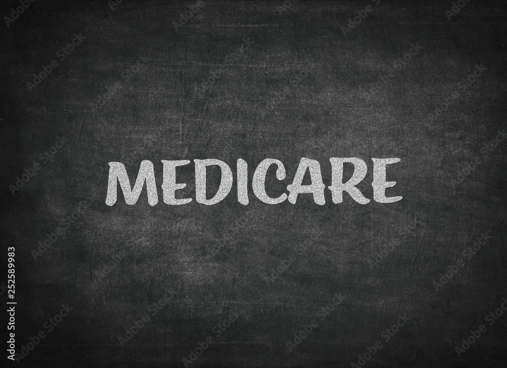 Fototapeta premium medicare concept word on a blackboard background