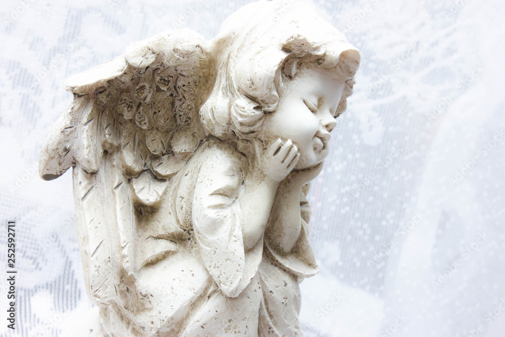 sitting stone angel on white background patterns sitting stone angel on white background patterns