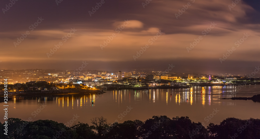 Plymouth City Panoramic Nightscape, with view across Plymouth Sound towards Smeatons Tower Lighthouse, Devon