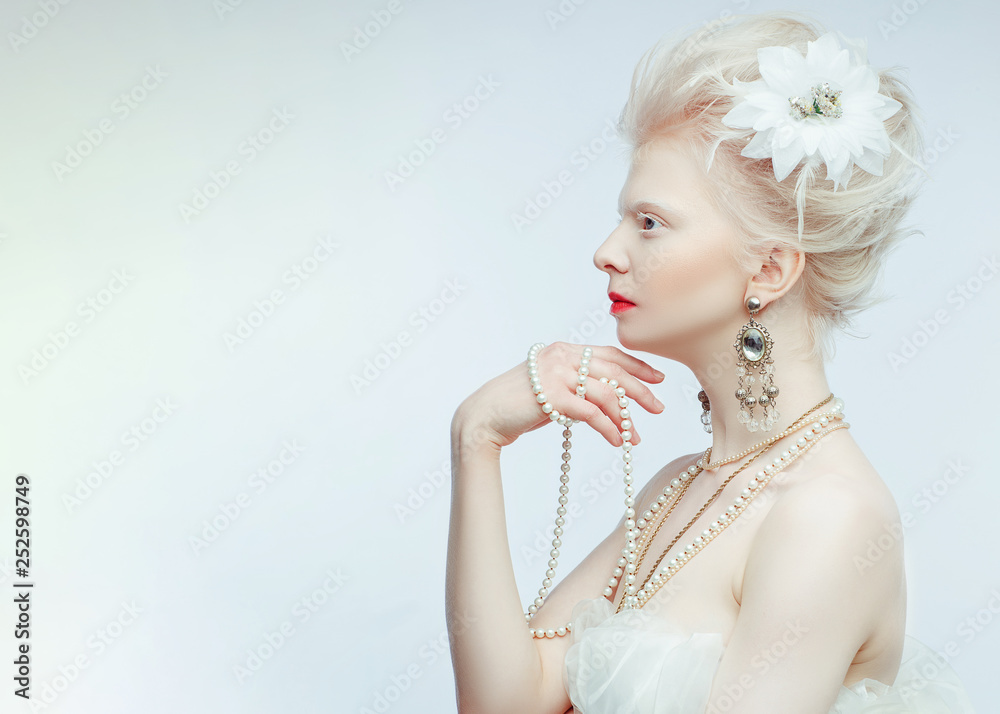 beautiful albino girl with red lips on white background