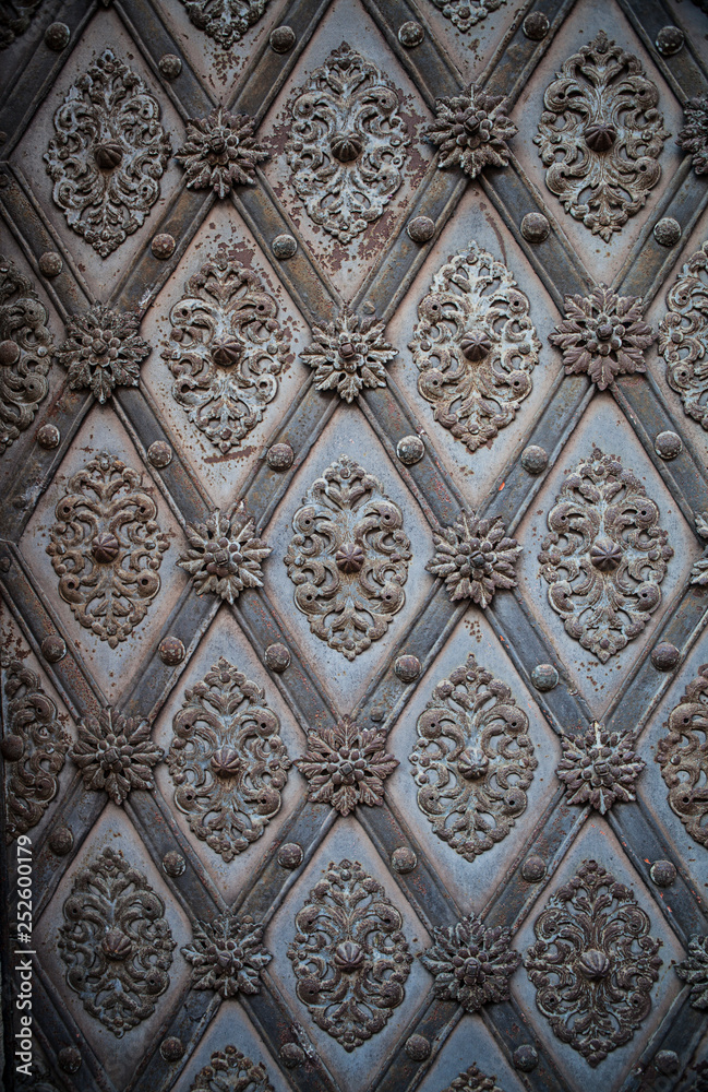 Pattern on an old metal door in Prague