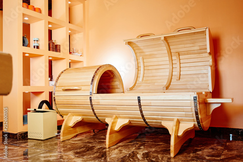 Wooden phytobox,  horizontal sauna in the stylish interior of the spa and wellness center photo