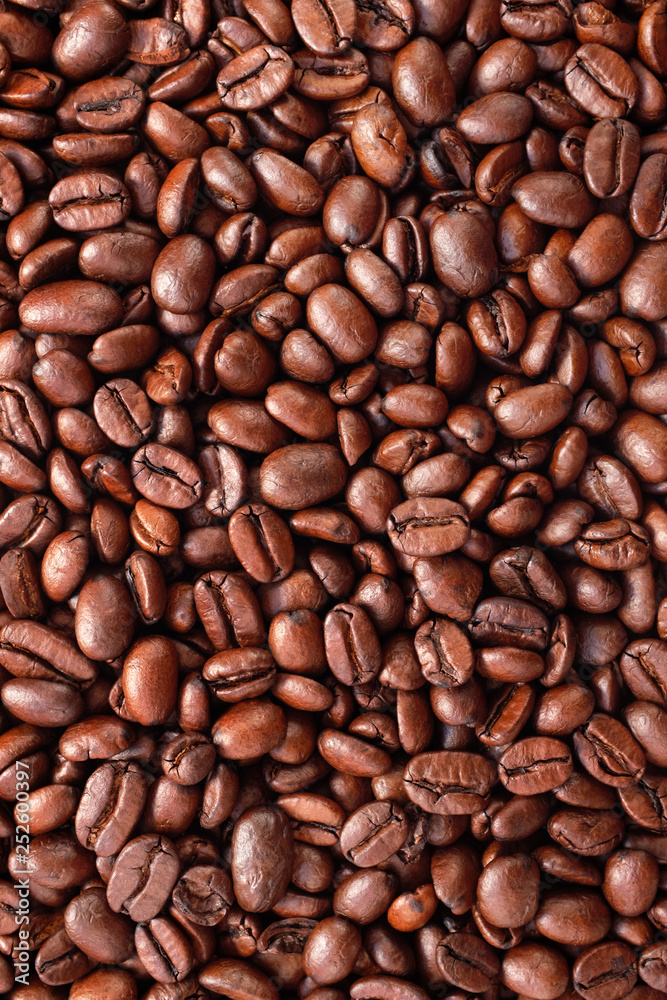 Dark roasted coffee beans background Dark roasted coffee beans background