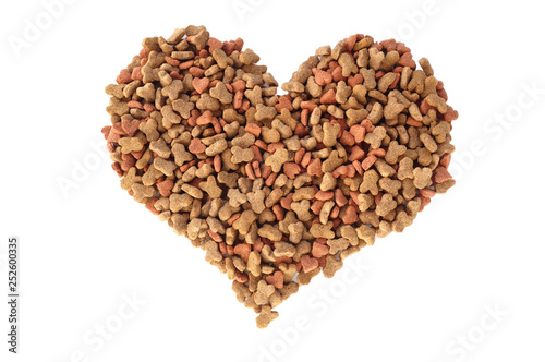 Dried cat food biscuits in a heart shape