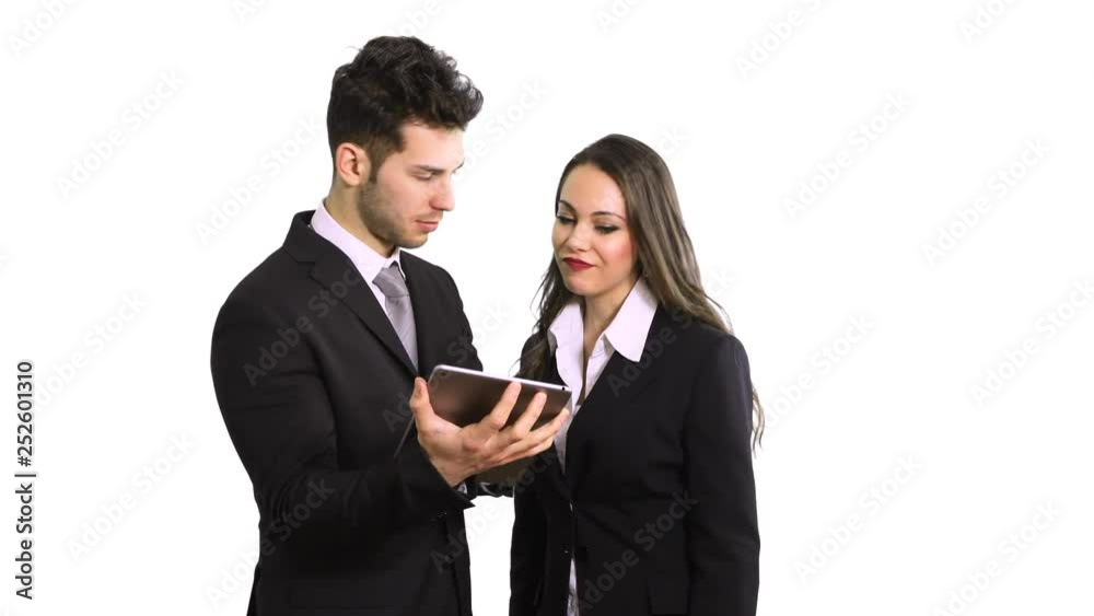 Portrait of young colleagues using a digital tablet isolated on white Portrait of young colleagues using a digital tablet isolated on white