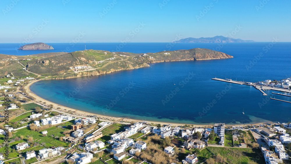 Aerial drone photo of beautiful Livadi beach and main port of Serifos island in spring, Cyclades, Greece