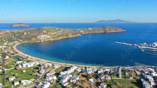 Fototapeta Naklejka Na Ścianę i Meble -  Aerial drone photo of beautiful Livadi beach and main port of Serifos island in spring, Cyclades, Greece