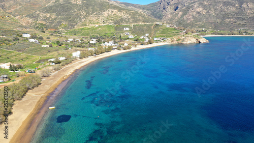 Aerial drone photo of beautiful sandy beach of Ganema with deep emerald sea in island of Serifos at spring, Cyclades, Greece