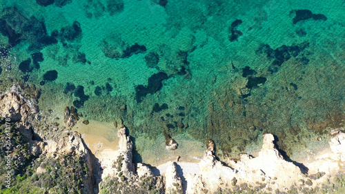 Aerial drone photo of beautiful sandy beach with deep turquoise sea of Vagia in island of Serifos at spring, Cyclades, Greece photo