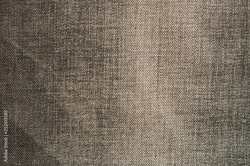 Texture of black jeans. Natural denim background. Close up.