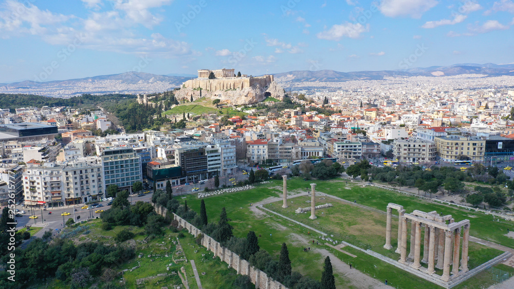 Aerial drone bird's eye view photo of iconic Acropolis hill and the Parthenon a masterpiece of Ancient world, Athens historic centre, Attica, Greece